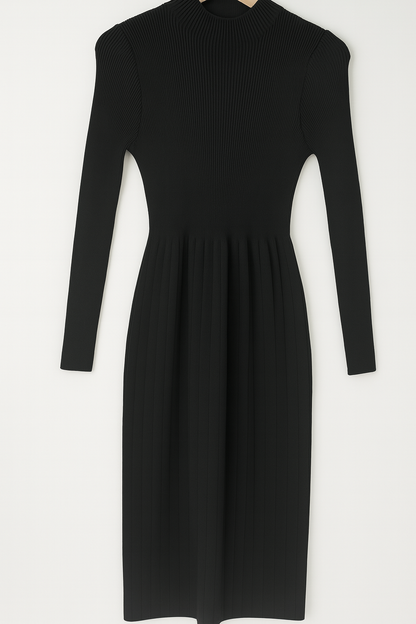 black ribbed knit dress paired with a pearl-detailed shrug